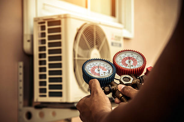 Professional Air Conditioning Service technician working in Pocasset, MA